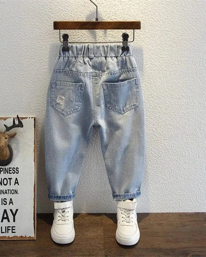 Trendy Kids Apparel Kids Clothing Teen Fashion Ripped Jeans with Harlequin Graphic Print