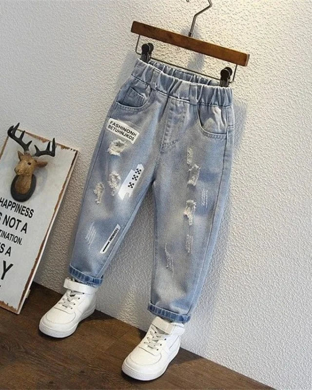 Trendy Kids Apparel Kids Clothing Teen Fashion Ripped Jeans with Harlequin Graphic Print